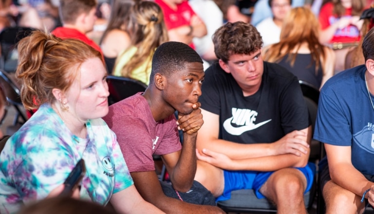 Group of students seated and listening