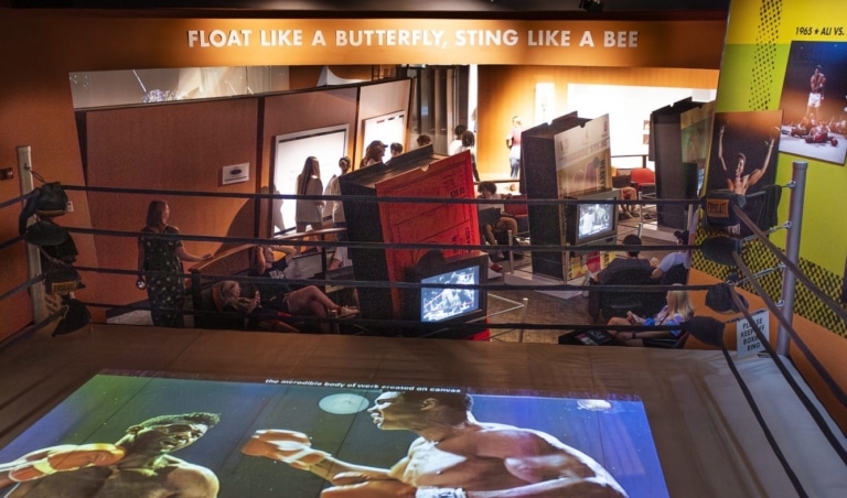 View of people exploring two levels of the Museum gallery.