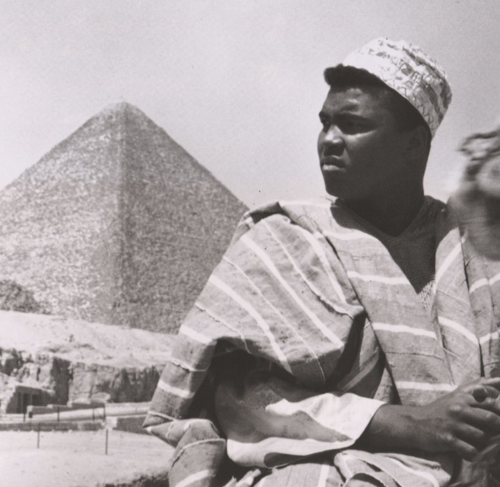 Black and white photo of Muhammad Ali in Egypt with pyramid in background