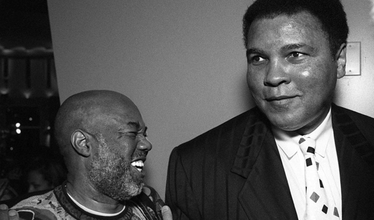 Black and white photo of Muhammad Ali and Howard Bingham