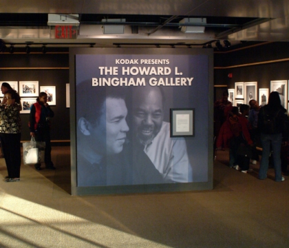 The Howard L. Bingham Gallery at the Muhammad Ali Center with guests looking at photographs